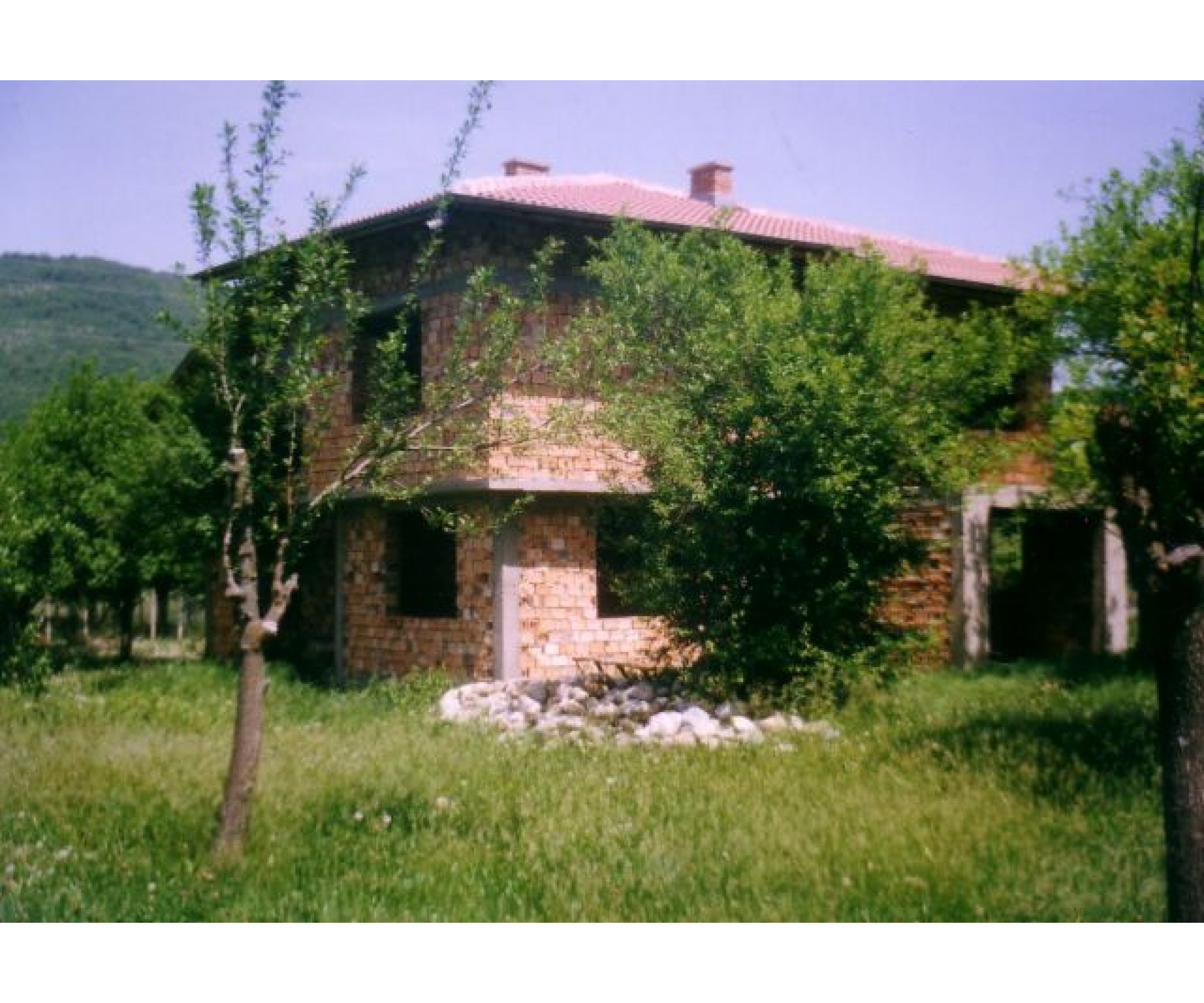 Two-storey house in the village of Asen